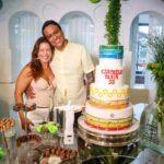 Flávia Cesar (produtora da Warner) e Carmelo Maia