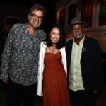 O casal Flavio Tambellini e Yohama Eshima e Antônio Pitanga