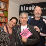 Isabela Simões e Augusto Herkenhoff cercando Alexandre Dacosta